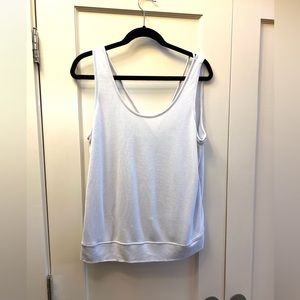 Fine-gauge knit tank. Unique straps in back.